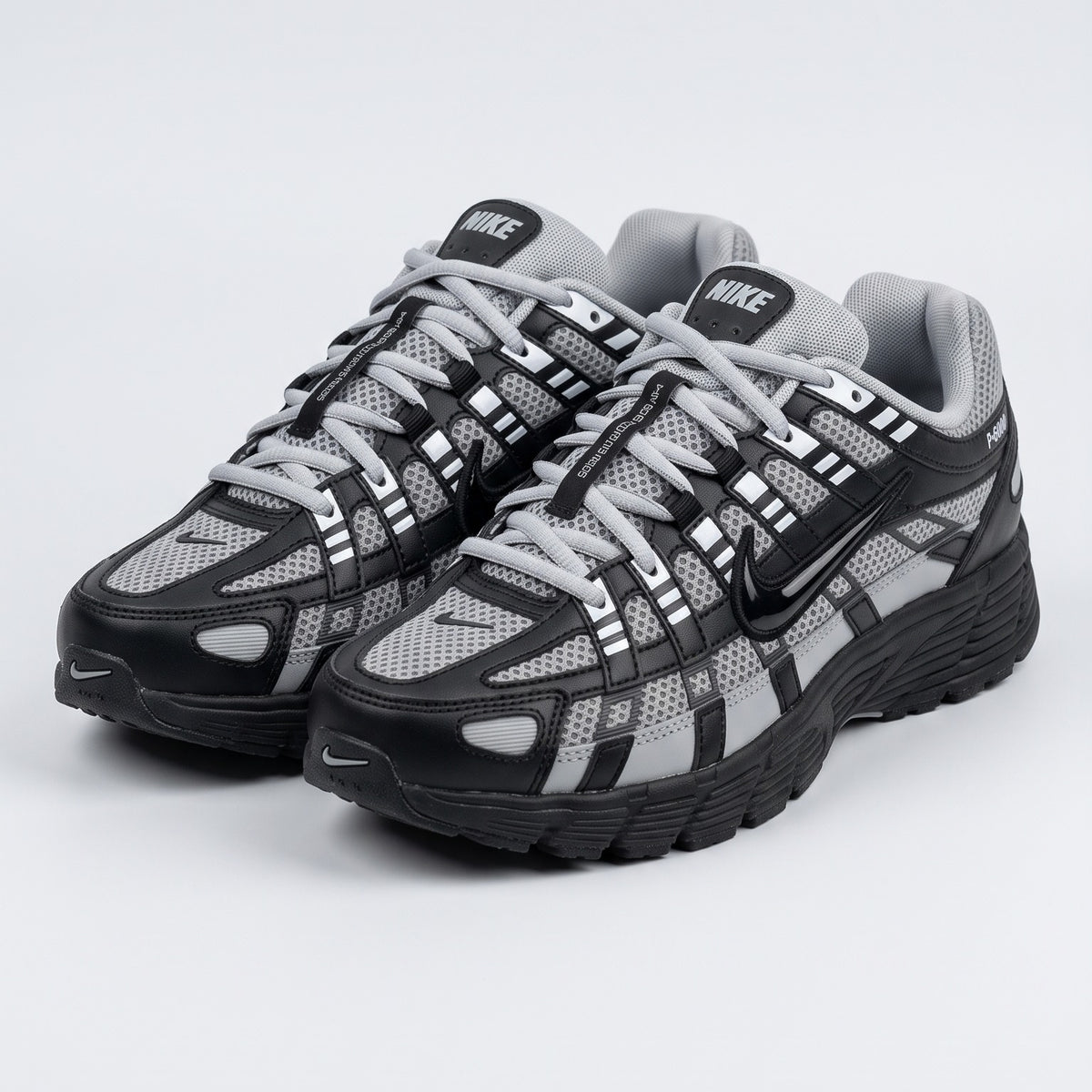 Nike P-6000 - Negro / Gris